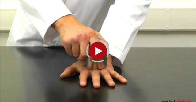 Super-strong Neodymium Magnets Crushing A Man's Hand