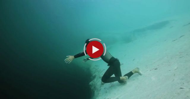 Guillaume Nery Base Jumping At Dean's Blue Hole, Filmed On Breath Hold By Julie Gautier