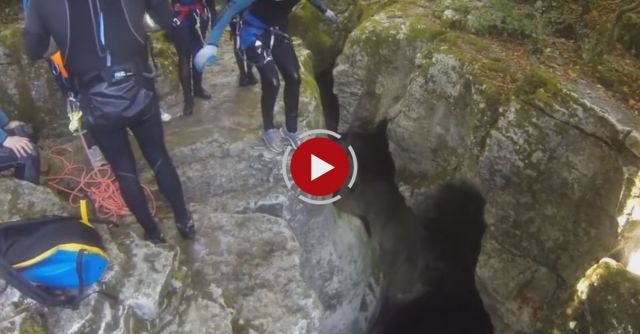 A Man Falls Into Water In A Canyon