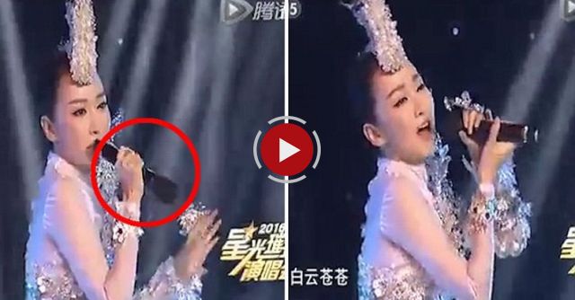 Chinese Singer Does Lip-synching Accidentally Exposes Herself By Holding The Microphone Upside Down